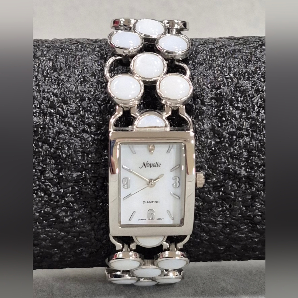 Novelle bracelet watch silver metal white mother of pearl face and stones